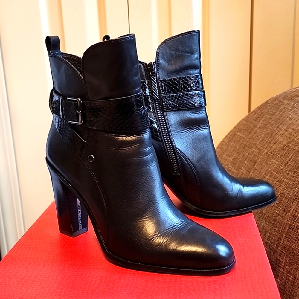 Donald J. Palmer black leather boots with snake skin detail.